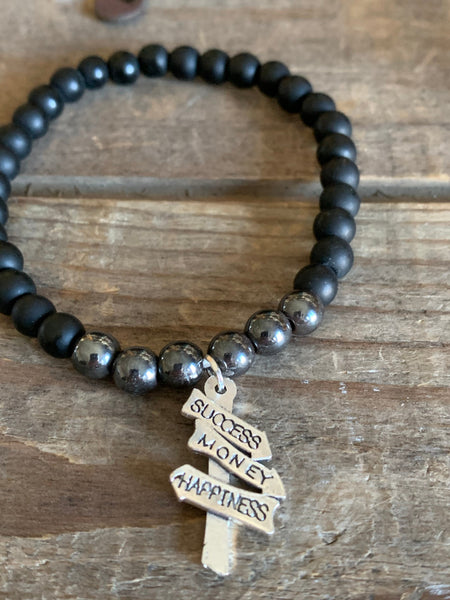 Bracelet silicone noir stainless et ton or Comme un ange