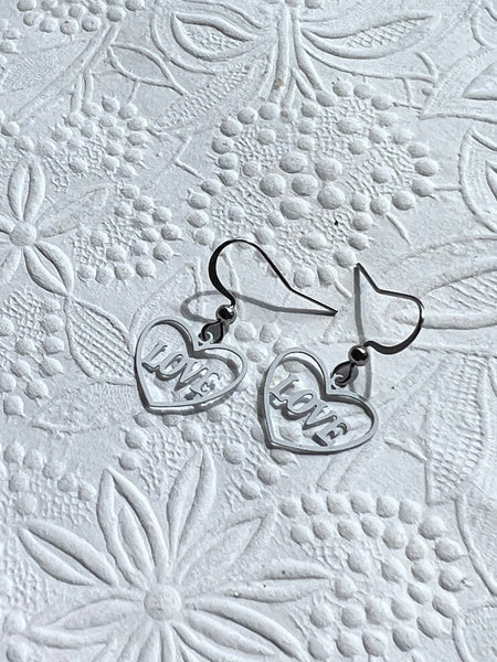 Boucles oreilles coeurs love blanches Comme un ange