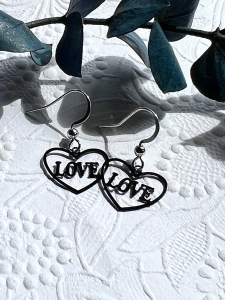 Boucles oreilles coeurs love noires Comme un ange