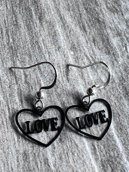 Boucles oreilles coeurs love noires Comme un ange