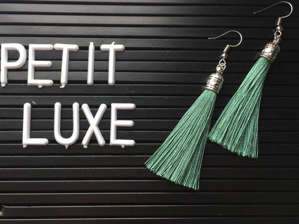 Boucles d’oreilles alliage de métaux argent et fils turquoises Comme un ange