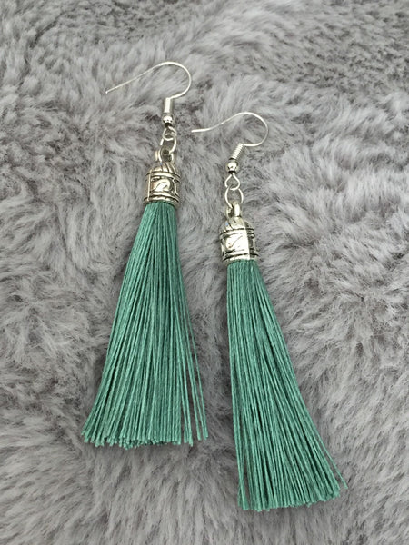 Boucles d’oreilles alliage de métaux argent et fils turquoises Comme un ange