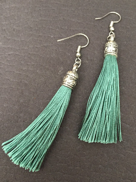 Boucles d’oreilles alliage de métaux argent et fils turquoises Comme un ange