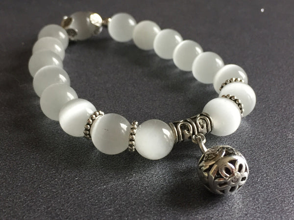 Bracelet blanc perlé Comme un ange