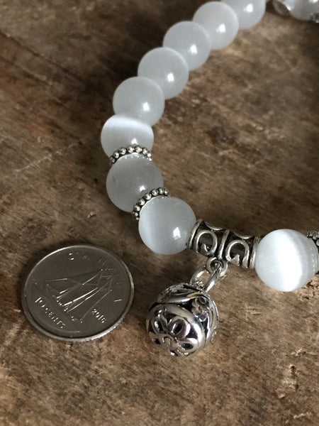 Bracelet blanc perlé Comme un ange