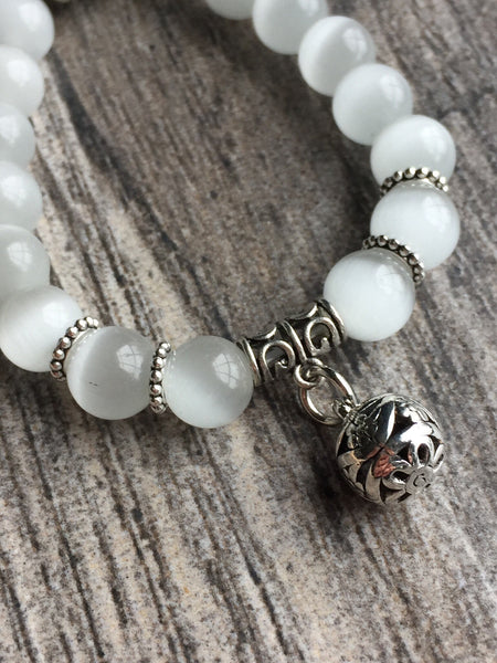 Bracelet blanc perlé Comme un ange