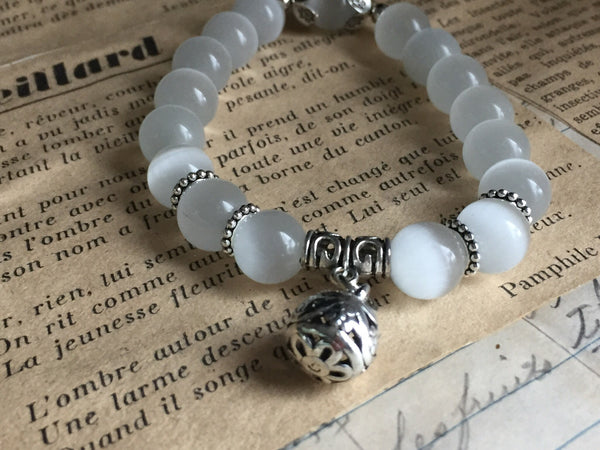 Bracelet blanc perlé Comme un ange