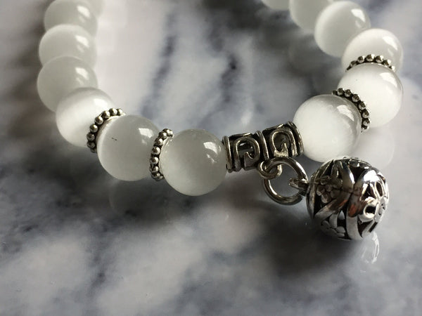 Bracelet blanc perlé Comme un ange