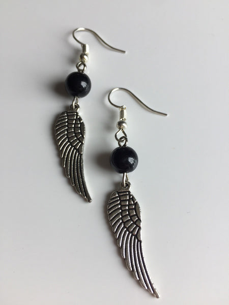 Boucles d’oreilles ailes d’ange perle noire Wing Angel Comme un ange