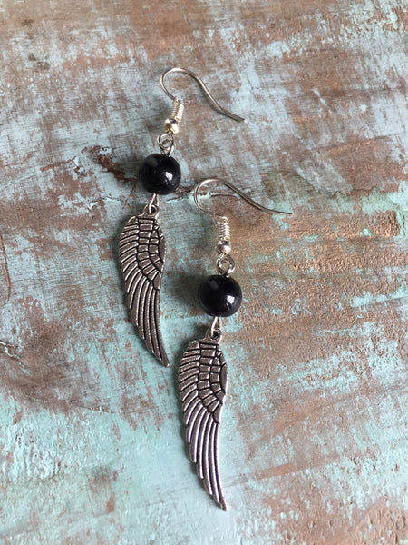 Boucles d’oreilles ailes d’ange perle noire Wing Angel Comme un ange