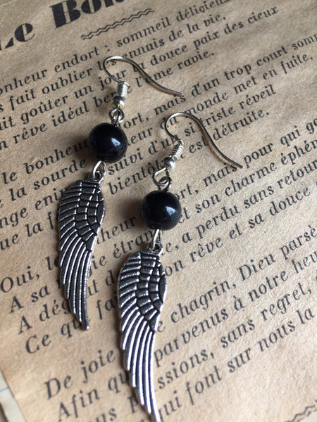 Boucles d’oreilles ailes d’ange perle noire Wing Angel Comme un ange