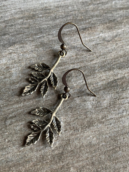 Boucles d’oreilles breloque feuille bronze Comme un ange