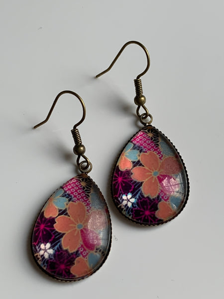 Boucles d’oreilles breloque de verre fleurs