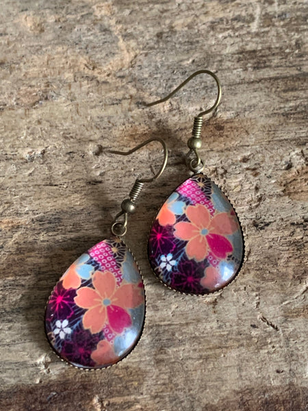 Boucles d’oreilles breloque de verre fleurs