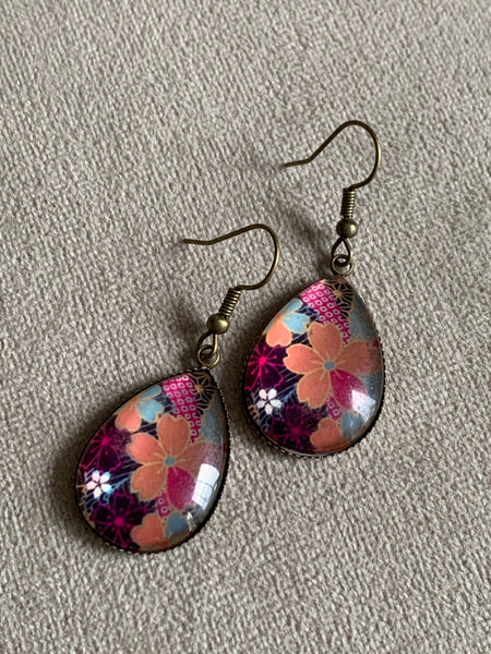 Boucles d’oreilles breloque de verre fleurs