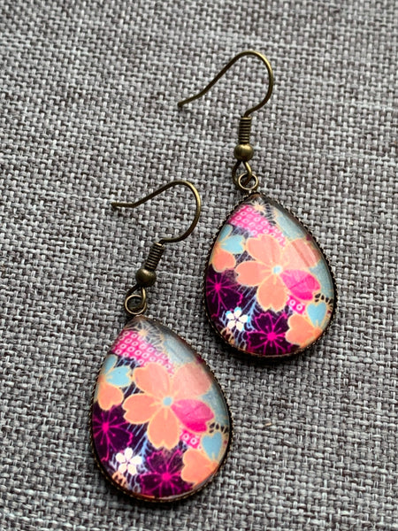 Boucles d’oreilles breloque de verre fleurs