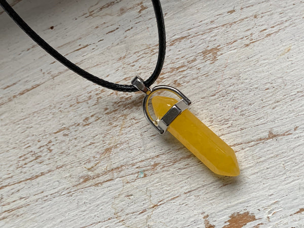 Collier pendule jaune sur corde de cuir pendulum mystique Comme un ange