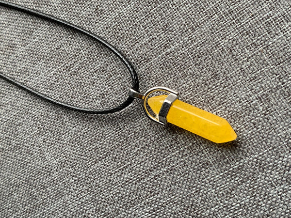 Collier pendule jaune sur corde de cuir pendulum mystique Comme un ange