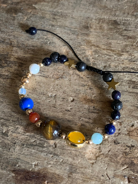 Bracelet ajustable espace et étoiles billes de verre Comme un ange