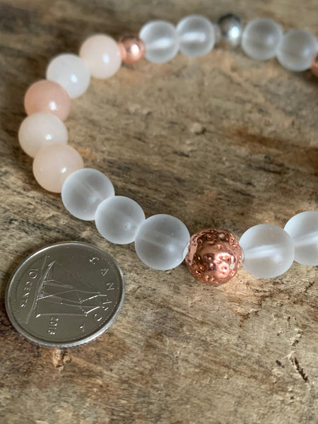 Bracelet élastique billes transparente de résine et billes rose gold Comme un ange