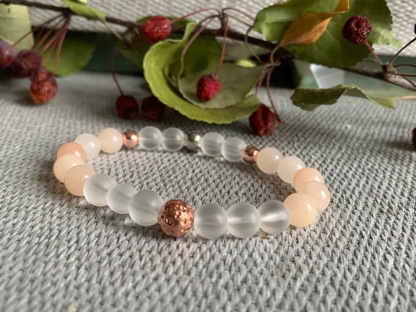 Bracelet élastique billes transparente de résine et billes rose gold Comme un ange