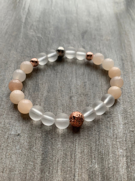 Bracelet élastique billes transparente de résine et billes rose gold Comme un ange