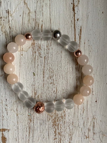 Bracelet élastique billes transparente de résine et billes rose gold Comme un ange