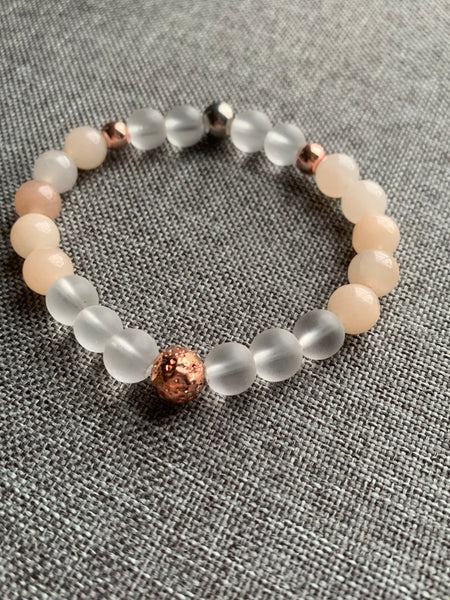 Bracelet élastique billes transparente de résine et billes rose gold Comme un ange