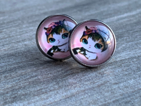 Boucles d’oreilles cabochon de verre alliage de métaux argent chaton noir sur fond rose Comme un ange