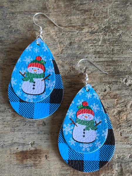 Boucles d’oreilles breloque de cuir bonhomme de neige sur fond bleu Comme un ange