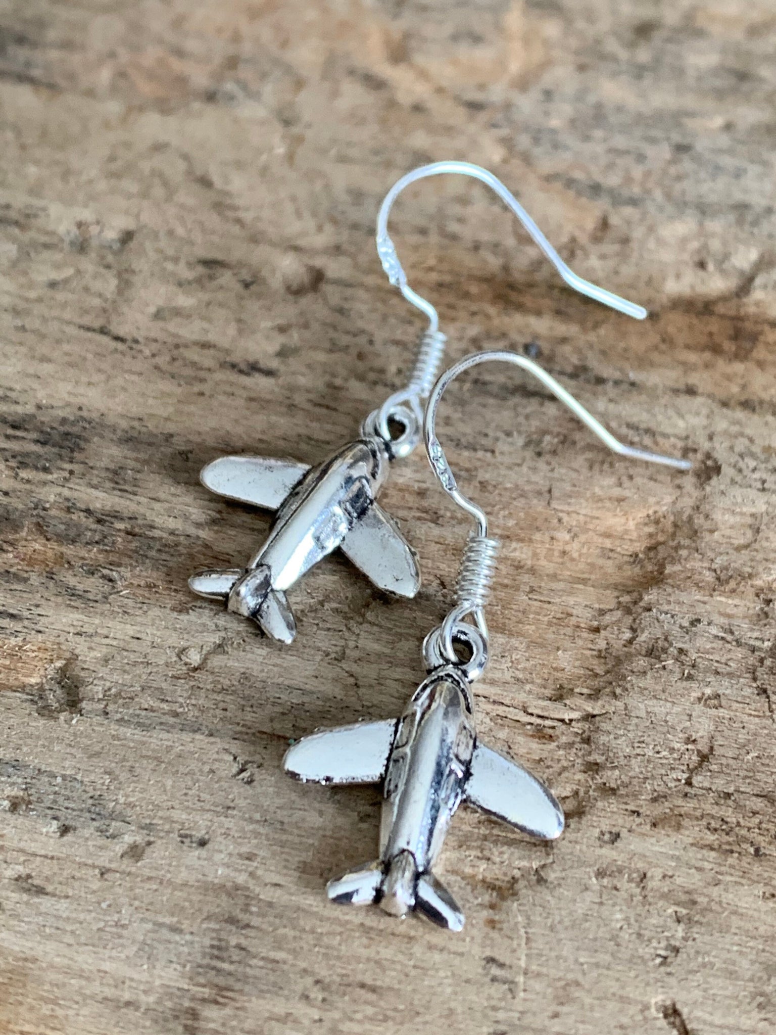Boucles d’oreilles breloque avion argent Comme un ange