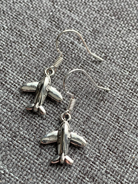 Boucles d’oreilles breloque avion argent Comme un ange