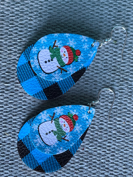 Boucles d’oreilles breloque de cuir bonhomme de neige sur fond bleu Comme un ange