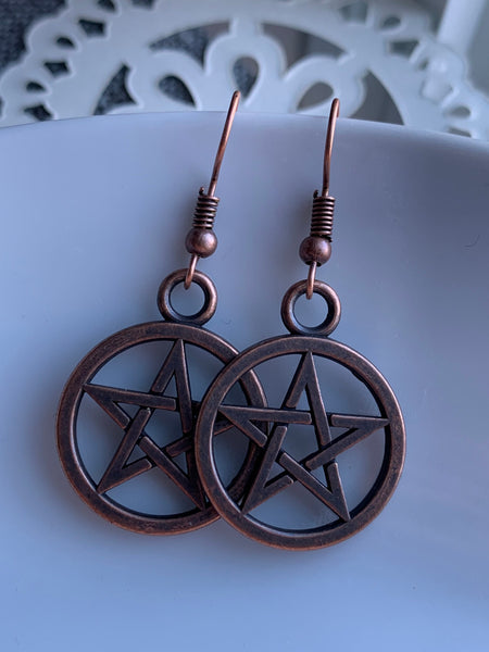 Boucles d’oreilles breloque étoile de sorcellerie alias de métaux bronze Comme un ange