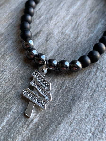 Bracelet silicone noir stainless et ton or Comme un ange