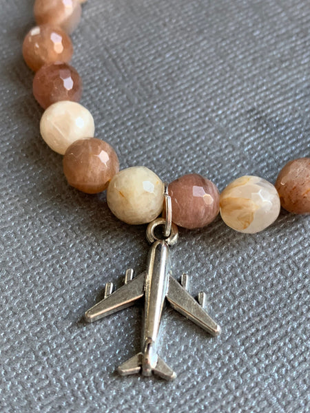 Bracelet pierre de soleil voyage avion Comme un ange
