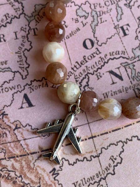 Bracelet pierre de soleil voyage avion Comme un ange