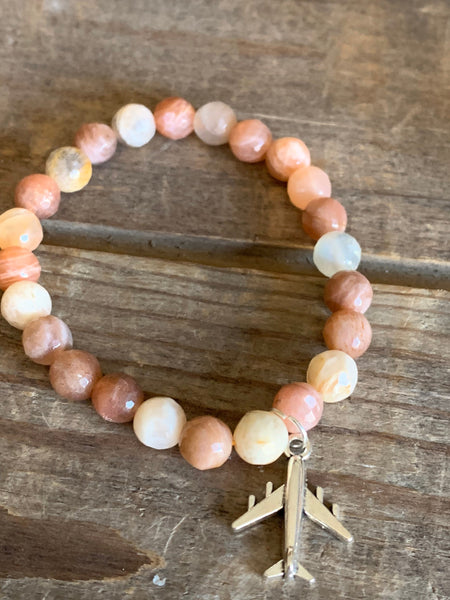 Bracelet pierre de soleil voyage avion Comme un ange