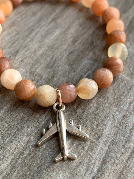 Bracelet pierre de soleil voyage avion Comme un ange