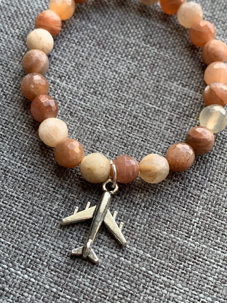 Bracelet pierre de soleil voyage avion Comme un ange