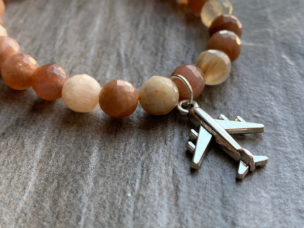 Bracelet pierre de soleil voyage avion Comme un ange
