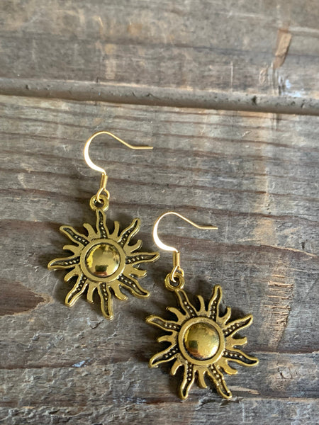 Boucles d’oreilles breloque soleil or alliage de métaux Comme un ange