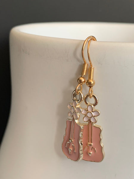 Boucles oreilles guitare rose Comme un ange