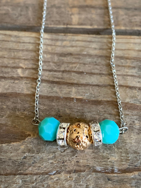 Collier pierre de lave ton or et billes turquoises  bijoux diffuseur Comme un ange