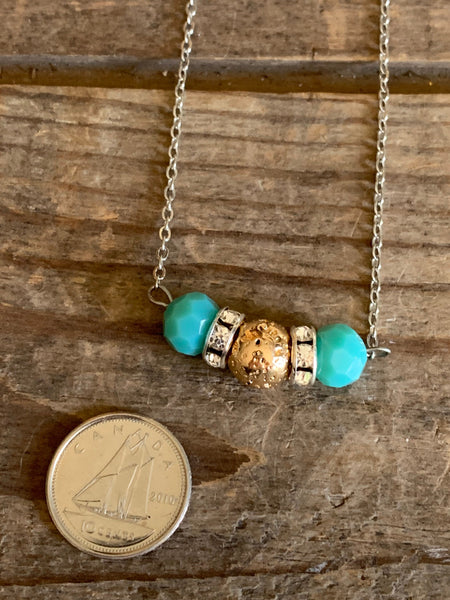 Collier pierre de lave ton or et billes turquoises  bijoux diffuseur Comme un ange