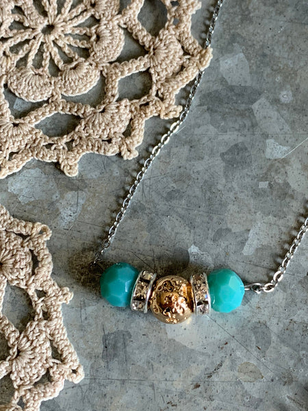 Collier pierre de lave ton or et billes turquoises  bijoux diffuseur Comme un ange