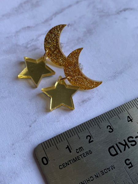 Boucles d’oreilles breloque lune et étoile Comme un ange