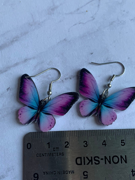 Boucles oreilles Papillon mauve et bleu Comme un ange