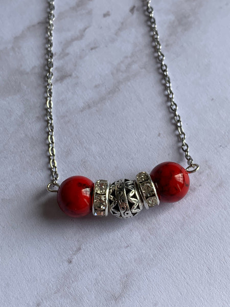 Collier rouge Comme un ange