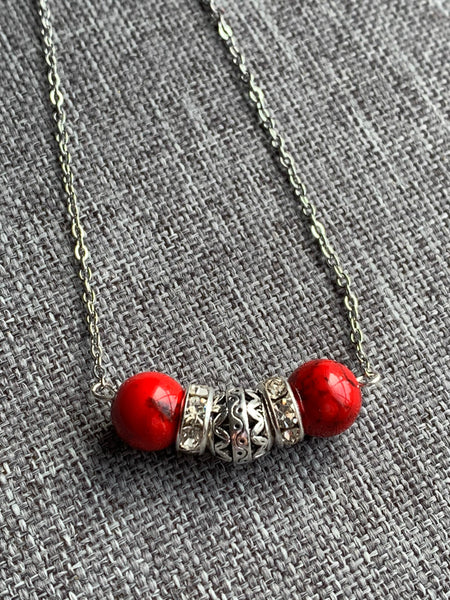Collier rouge Comme un ange